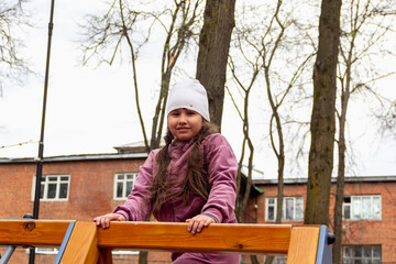 Girls playing outdoors with a ball in a park