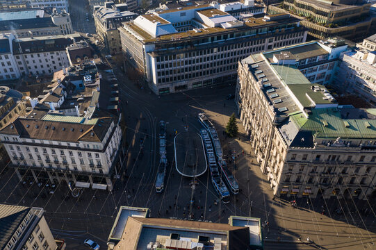 Zurich, Switzerland - December 13 2021: Aerial view of tramways by the Parade Platz in Zurich business and financial district with the HQ of Credit Suisse and UBS banks.