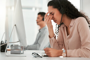 Stress, headache and woman customer service consultant with computer in office with burnout for crm. Migraine, exhausted and female with headset for technical support, telemarketing or call center. - obrazy, fototapety, plakaty