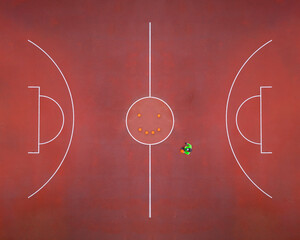 Aerial view of a man playing basketball. Fair play concept.