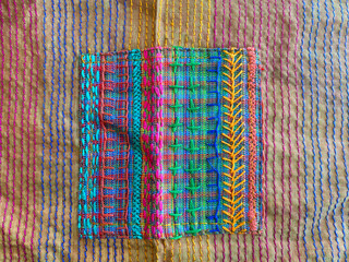 Blue multi colored patchwork on  self stitching cotton fabric