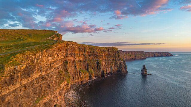 Aerial landscape cliffs of Moher at sunset in County Clare. Ireland