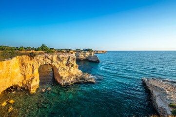 view at dawn of the Faraglioni of S. Andrea, Melendugno, Lecce, Puglia