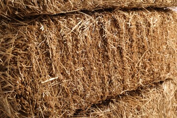 Bales of dried straw as background, closeup