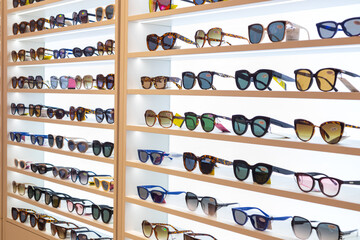 View of various kinds of sunglasses and fashion eyewear in shop window