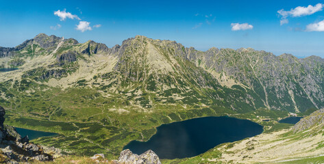 Dolina Pieciu Stawow Polskich with lakes nad peaks above from Szpiglasowy Wierch in High Tatras mountains in Poland
