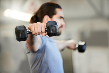 Athletic, man and hands with dumbbells for fitness in gym for goals for strong or healthy body....
