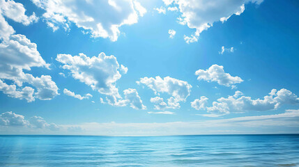 Fototapeta na wymiar Blue sea and sky with white clouds. Beautiful nature background