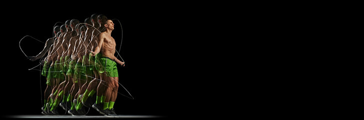 Muscular, shirtless man in motion training, jumping rope against black background with stroboscope...