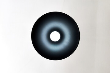 bottom view of a led lamp with a black shade