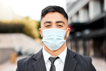 Face mask, business and portrait of Indian man in city for healthcare, security or outdoor safety...