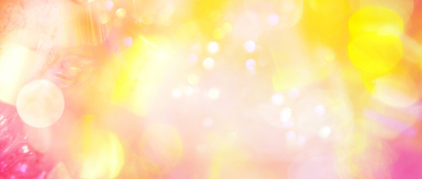 Strahlender abstrakter Hintergrund mit hellen, funkelnden Lichtern in Gelb, Orange und Rosa für positive, freudige, energetisierende und lebensbejahende Inhalte