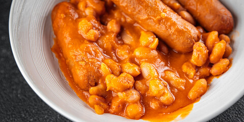 beans with sausages tomato sauce fresh cooking appetizer meal food snack on the table copy space...