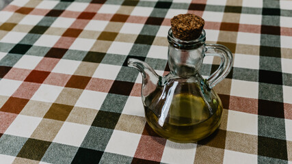 Glass jug with olive oil