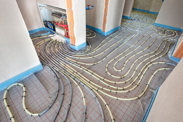 underfloor heating system in construction of new built house - 792935035