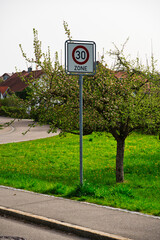 speed limit road sign in areas with many children