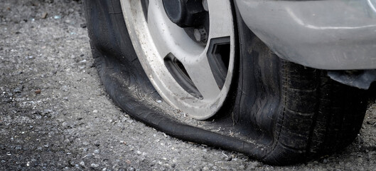 Flat Tire Vehicle Car on Road Danger Dangerous Stranded Deflated - 792938403