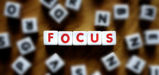 Word Focus Mixed with Letters Representing Achievement Through Effort