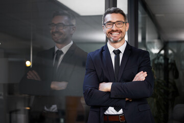 Happy, portrait and mature businessman in office of law firm or company, professional and proud. Male entrepreneur or ceo of business, confident and excited for growth of legal agency and attorney