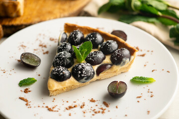 Pastry cream cake with grapes.