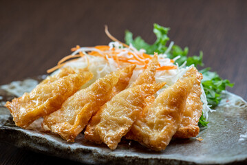 Deep-fried tofu with sweet and sour sauce.