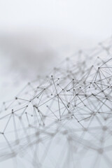 A minimalist background inspired by wireframe models used in computer graphics, featuring a series of interconnected lines and shapes forming a three-dimensional grid. 
