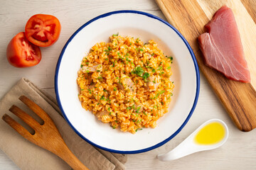 Spanish rice paella with fresh Almadraba tuna from Cadiz. © Leckerstudio