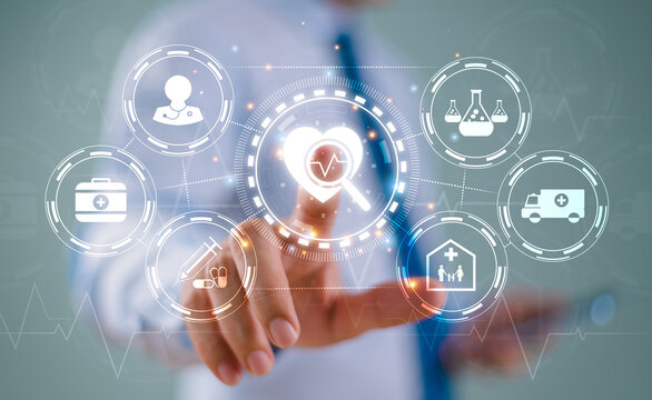 Medical business technology concept with hospital innovation equipment background. Businessman point medical network connection icon. Doctor health care insurance. Ai tech research healthcare data