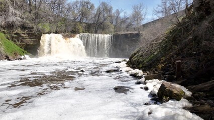 Beautiful waterfall Medina Falls, NY with 40 foot drop over limestone shelf destination for kayakers and tourist who visit this small town in up state New York