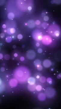 Vertical video clip, computer render, screensaver for smartphone, tablet. Many particles with purple defocused clouds float on a dark background.