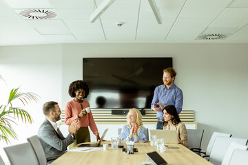 Collaborative team engaging in a creative brainstorming session office space