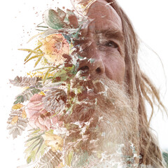 A bearded man's paintography merged with a floral painting in double exposure