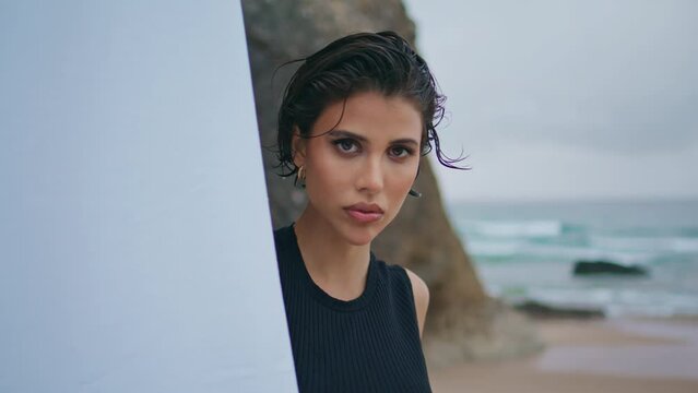 Glamour woman posing shore closeup. Professional fashion model looking camera