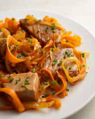 Atun encebollado. Traditional spanish tapa with premium tuna cooked with onions.