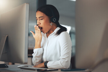 Woman, call centre and yawn at night, burnout and secretary or assistant tired in office. Female person, sleepy and receptionist or fatigue and overworked, exhausted and operator for consulting
