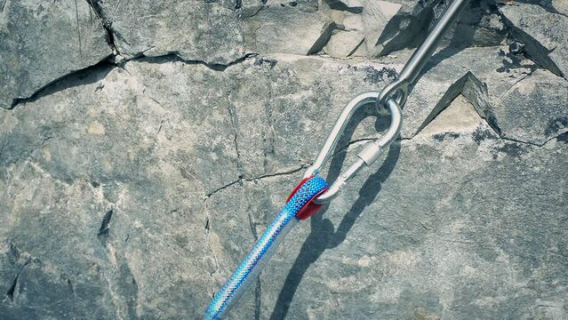 Grappling Hook Grips Rock Face Mountain Climbing 3 Shots