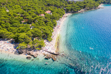 Punta Rata beach in Brela, Croatia, aerial view. Adriatic Sea with turquoise clean water and white...