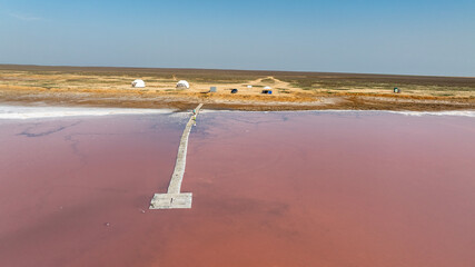 Mekletin pink salt lake on a sunny spring day in the steppe of Kalmykia
