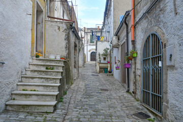 Fototapeta na wymiar A street in Orsara di Puglia, a medieval village in the province of Foggia in Italy.