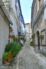 Fototapeta na wymiar A street in Orsara di Puglia, a medieval village in the province of Foggia in Italy.