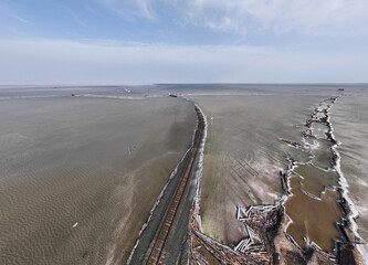 cosmic unreal landscapes of the Baskunchak salt lake on a spring day from the height of a drone...