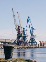 old port with industrial building and crane