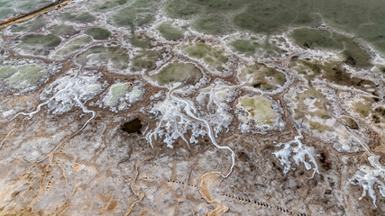 cosmic unreal landscapes of the Baskunchak salt lake on a spring day from the height of a drone flight