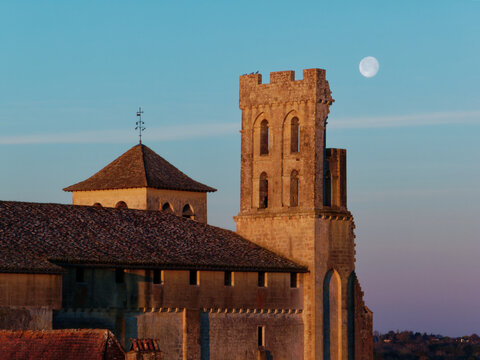 Moon and church of Saint Avi Seigneur, village in Dordogne, Nouvelle-Aquitaine