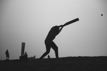 Cricketer black and white silhouette