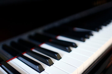 Black Yamaha piano. Close up of the keyboard.