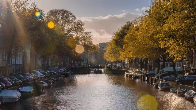 Amsterdam Netherlands time lapse 4K, city skyline timelapse at canal waterfront