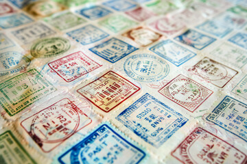 Background with various stamps in passport. Travel texture in the form of stamps in passport 