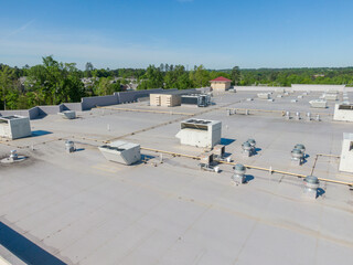 Drone Images of TPO Flat Commercial Roof With Metal Panels: New & Existing Construction 