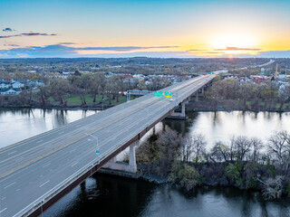 Late afternoon spring aerial view of U.S. Route 7 looking west, Troy, NY, over the Hudson River.